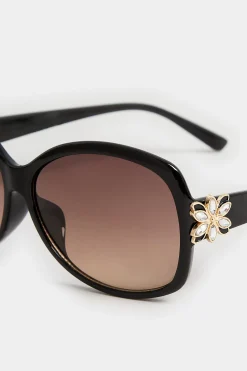 M&Co Yours Yours Black Oversized Floral Detail Sunglasses><noscript><img width=